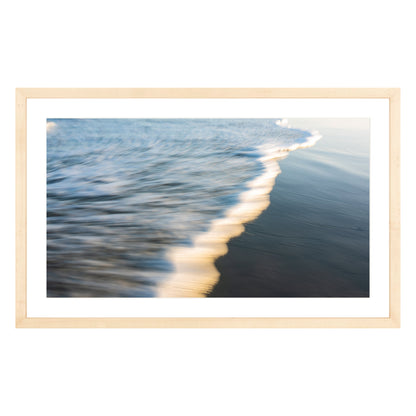 Photograph of wave at Atlantic Ocean framed in natural wood with white mat