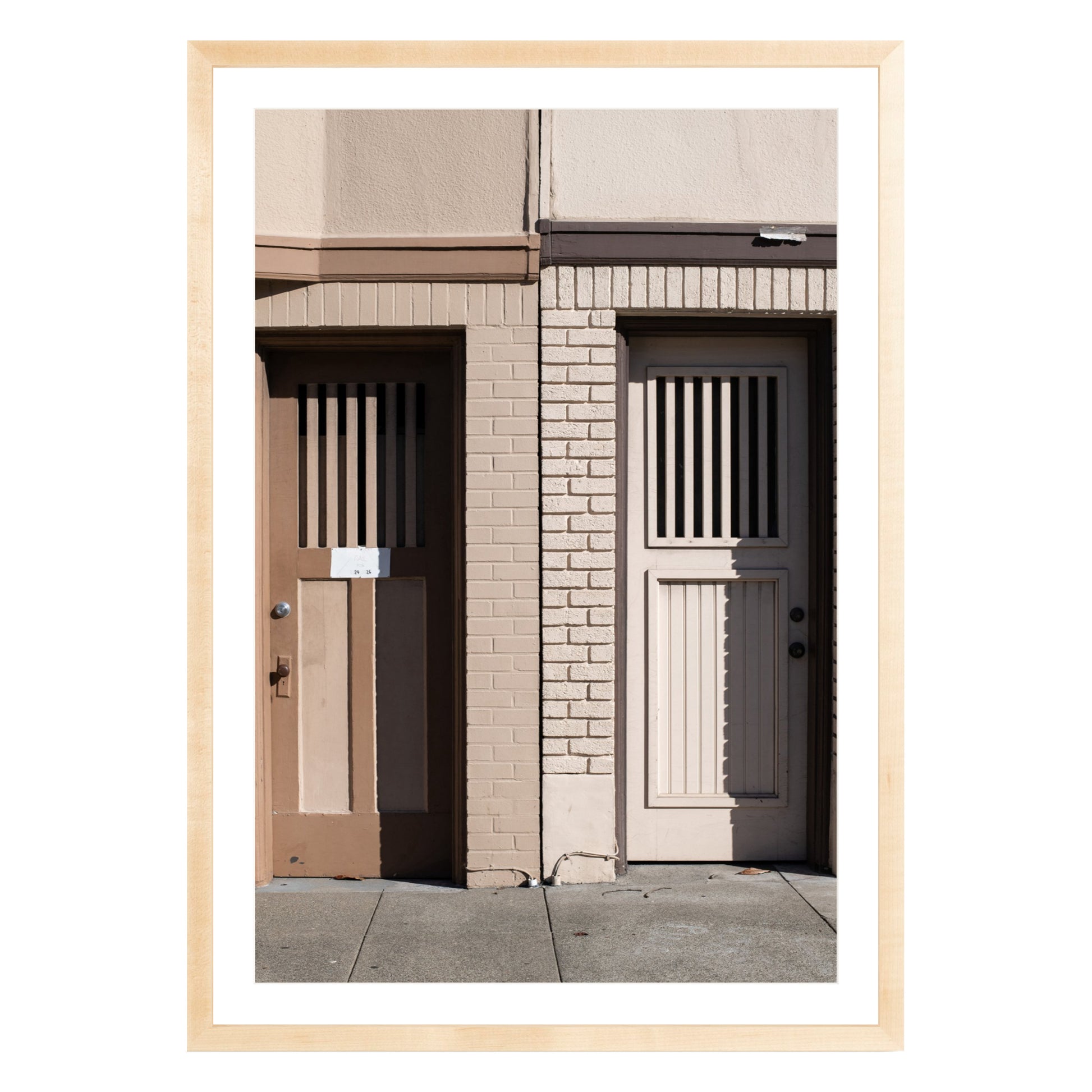 Photograph of two doors in San Francisco framed in natural wood with white mat