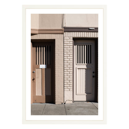 Photograph of two doors in San Francisco framed in white with white mat