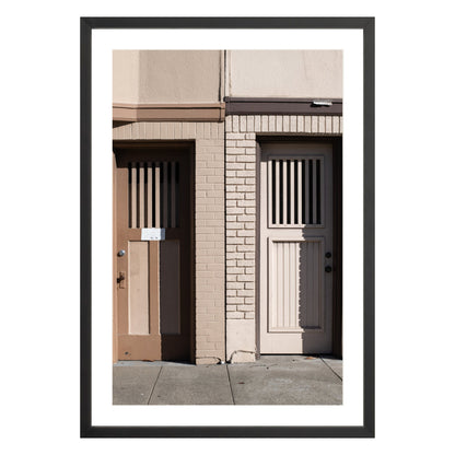 Photograph of two doors in San Francisco framed in black with white mat