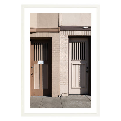 Photograph of two doors in San Francisco framed in white with white mat