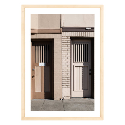Photograph of two doors in San Francisco framed in natural wood with white mat