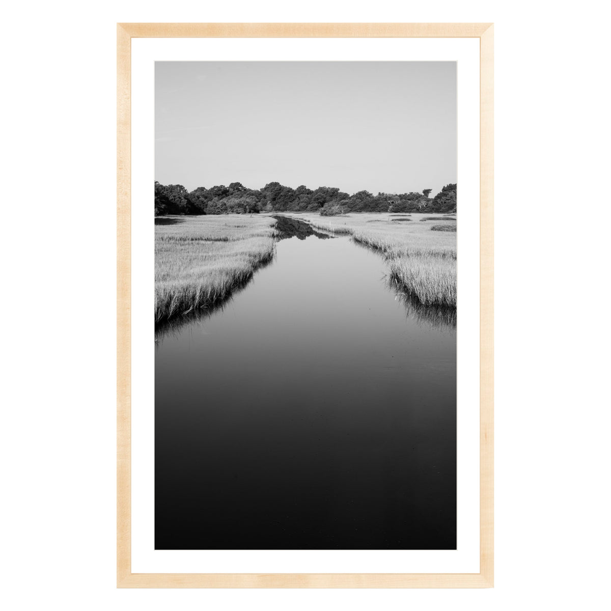 Black and white photograph of a marsh stream on Kiawah Island, South Carolina framed in natural wood with white mat