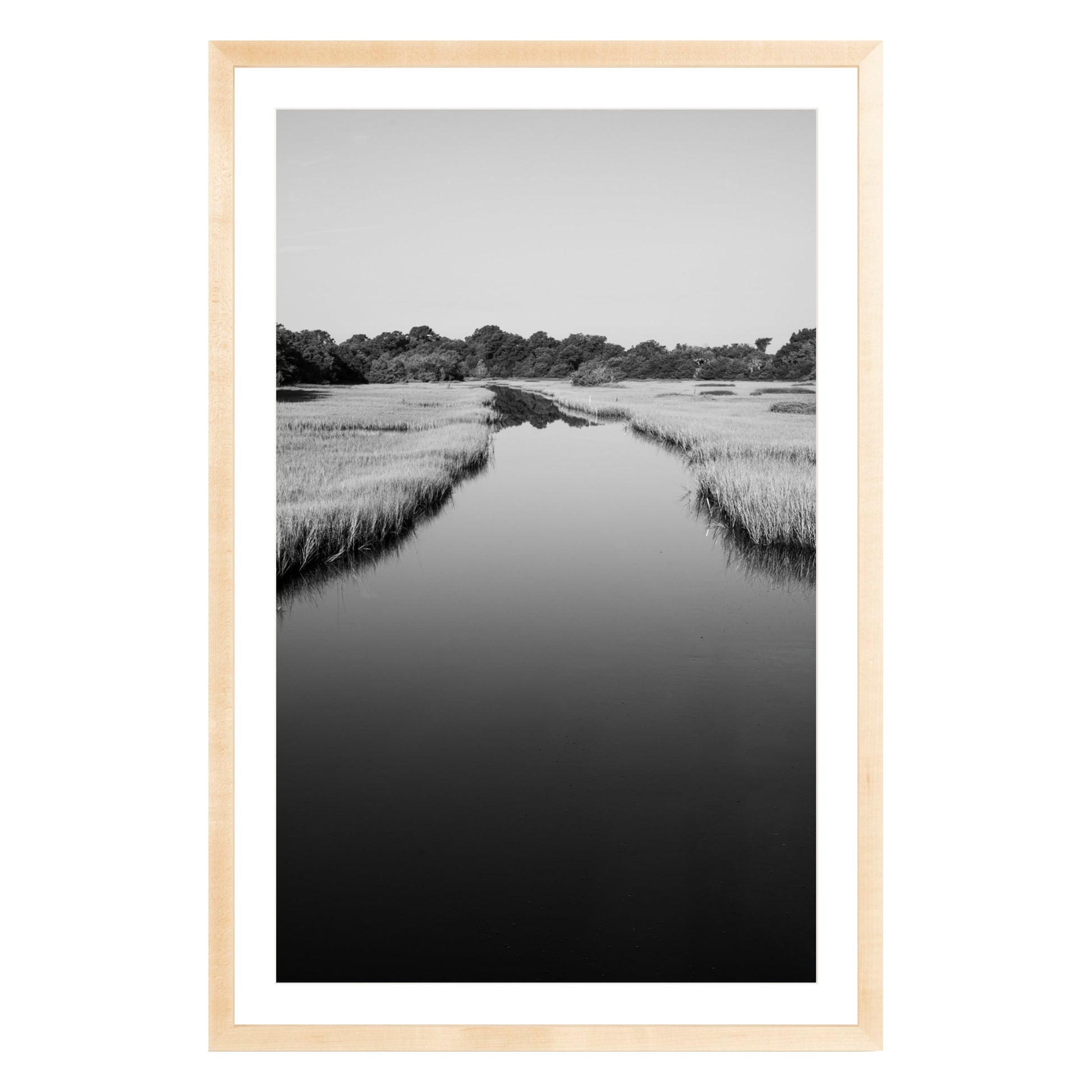 Black and white photograph of a marsh stream on Kiawah Island, South Carolina framed in natural wood with white mat