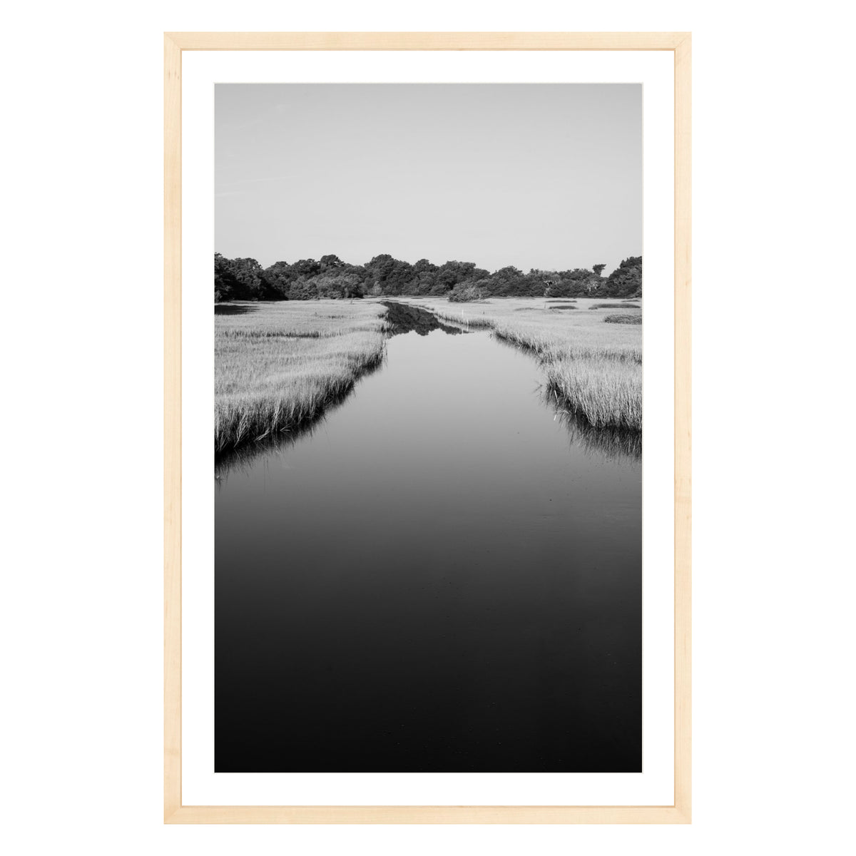 Black and white photograph of a marsh stream on Kiawah Island, South Carolina framed in natural wood with white mat