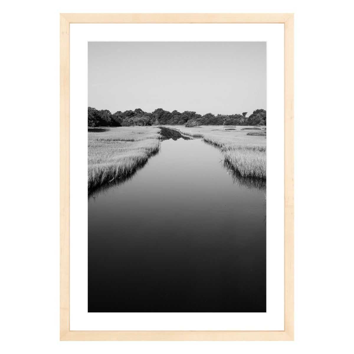 Black and white photograph of a marsh stream on Kiawah Island, South Carolina framed in natural wood with white mat