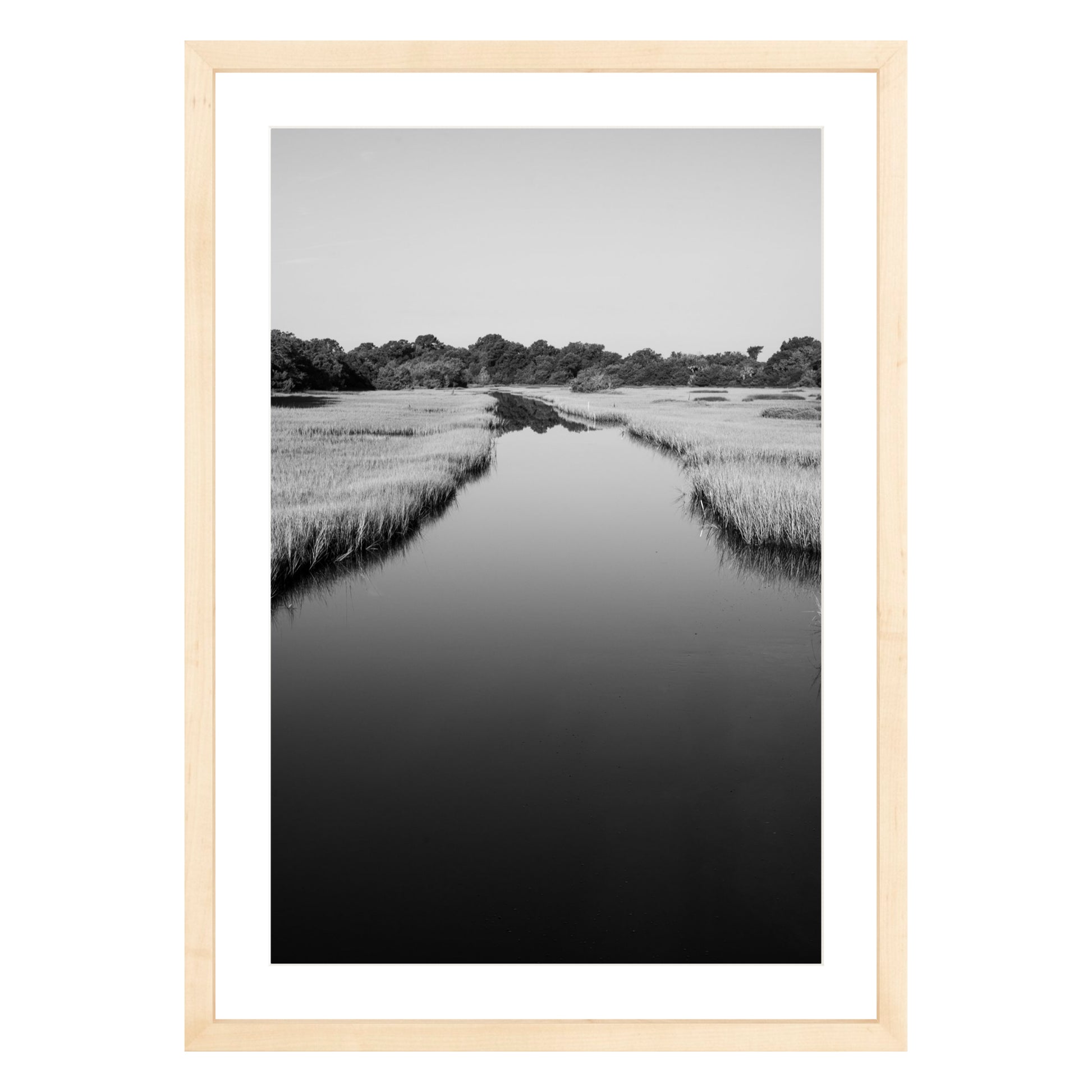 Black and white photograph of a marsh stream on Kiawah Island, South Carolina framed in natural wood with white mat