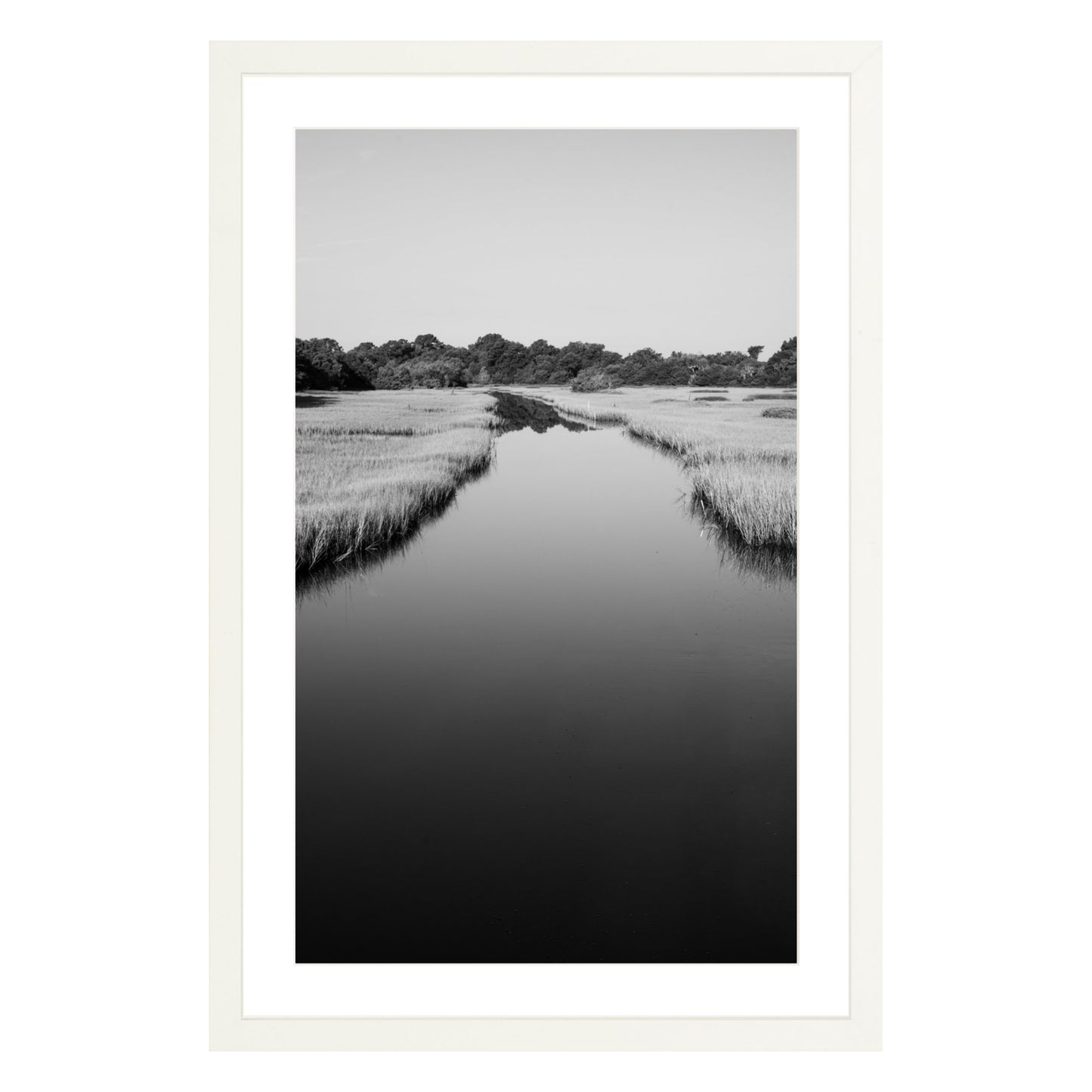 Black and white photograph of a marsh stream on Kiawah Island, South Carolina framed in white with white mat