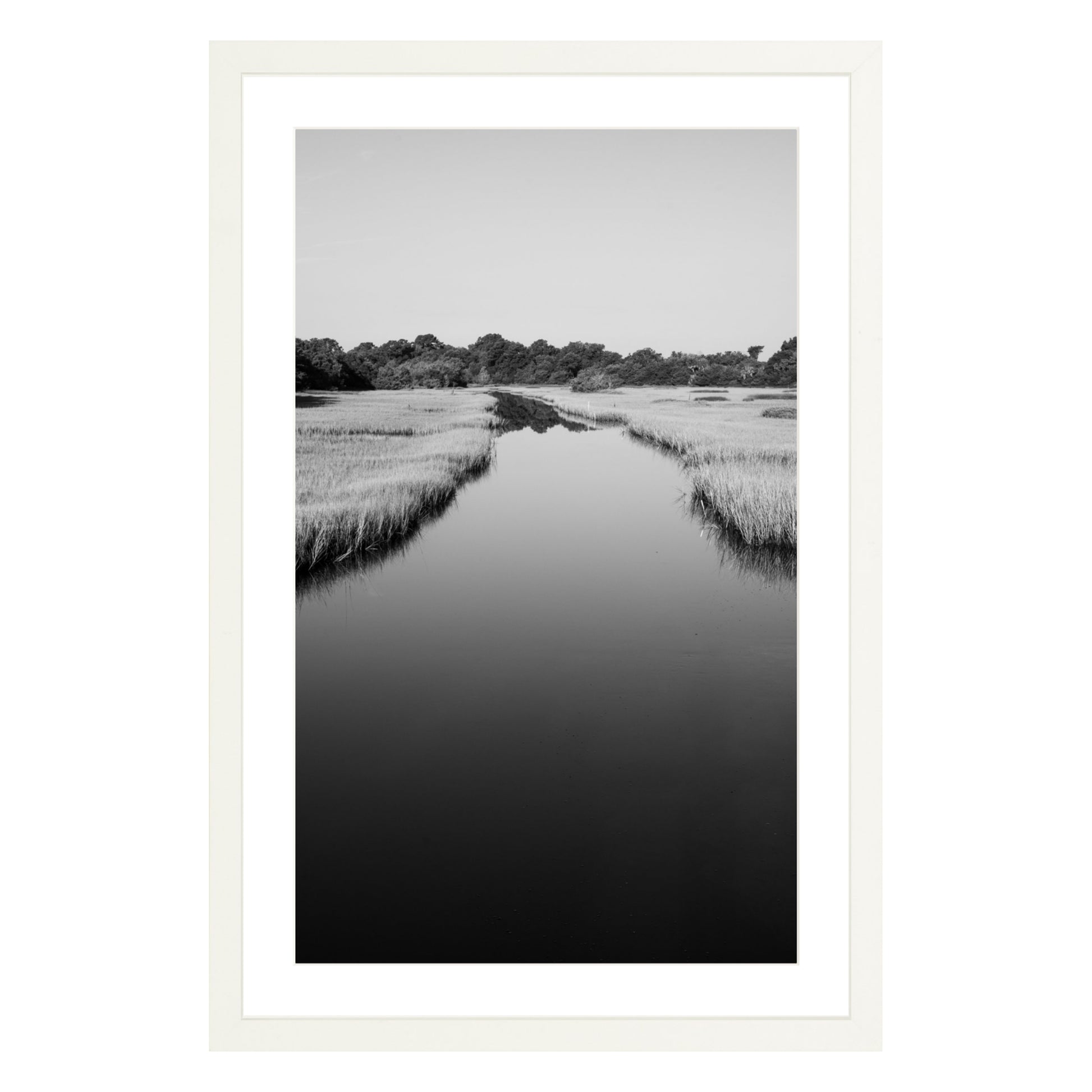 Black and white photograph of a marsh stream on Kiawah Island, South Carolina framed in white with white mat