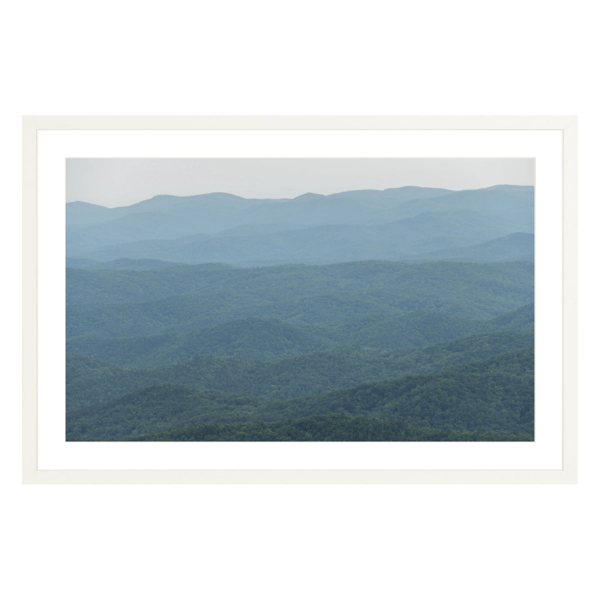 Photograph of mountains in North Carolina framed in white with white mat