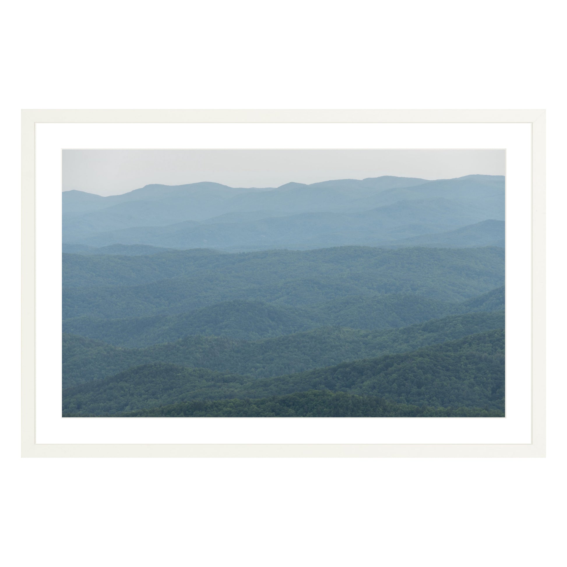 Photograph of mountains in North Carolina framed in white with white mat