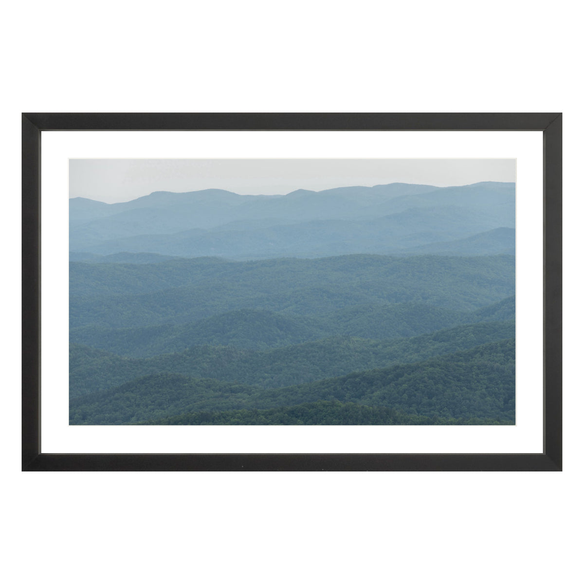 Photograph of mountains in North Carolina framed in black with white mat