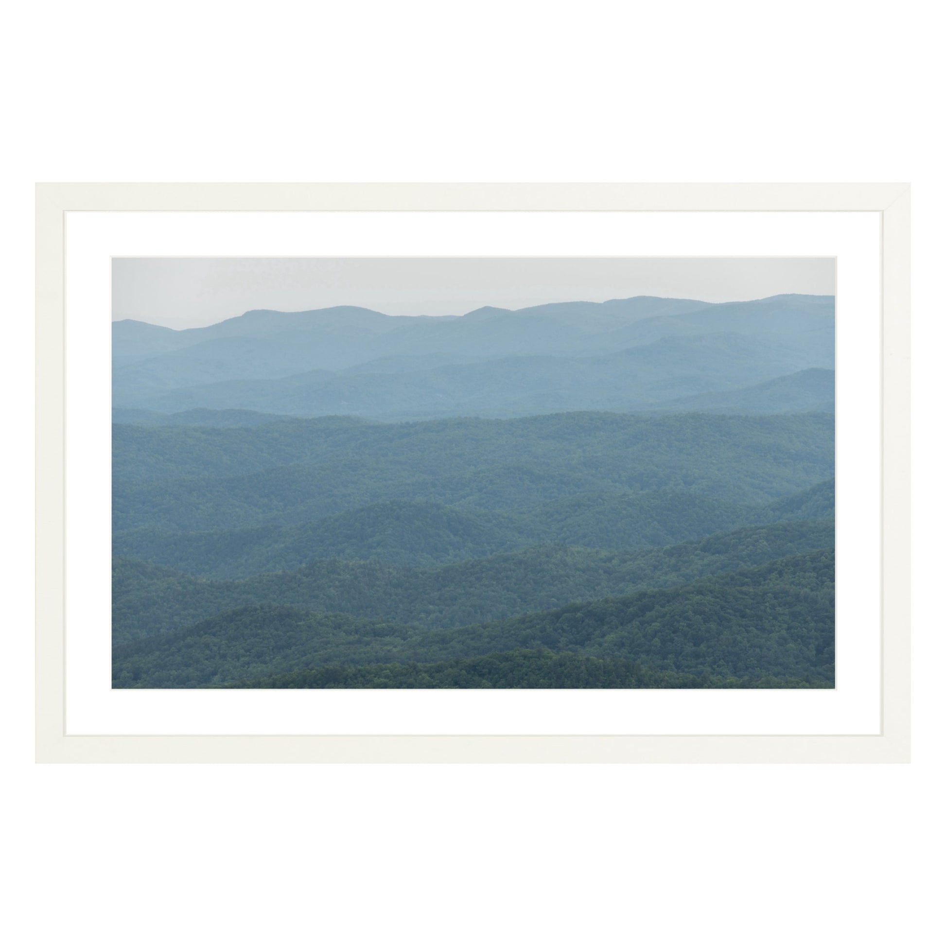 Photograph of mountains in North Carolina framed in white with white mat