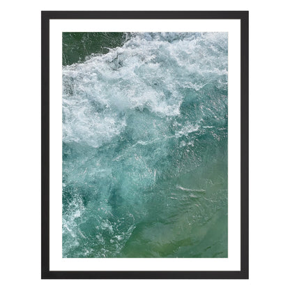 Photograph of ocean waves in Carmel California framed in black with white mat
